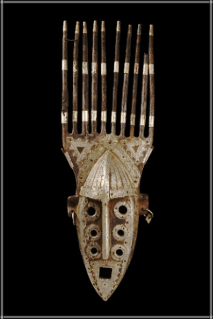 African Mask wood title_ fier artist Name_ Ghislain rex 1998 dead artist Tanzania Size_ 60 cm x 10 cm weight 7 kg website_ www.worldvirtualmuseum.com_Africa Email_ mulabaaudry1@gmail.com